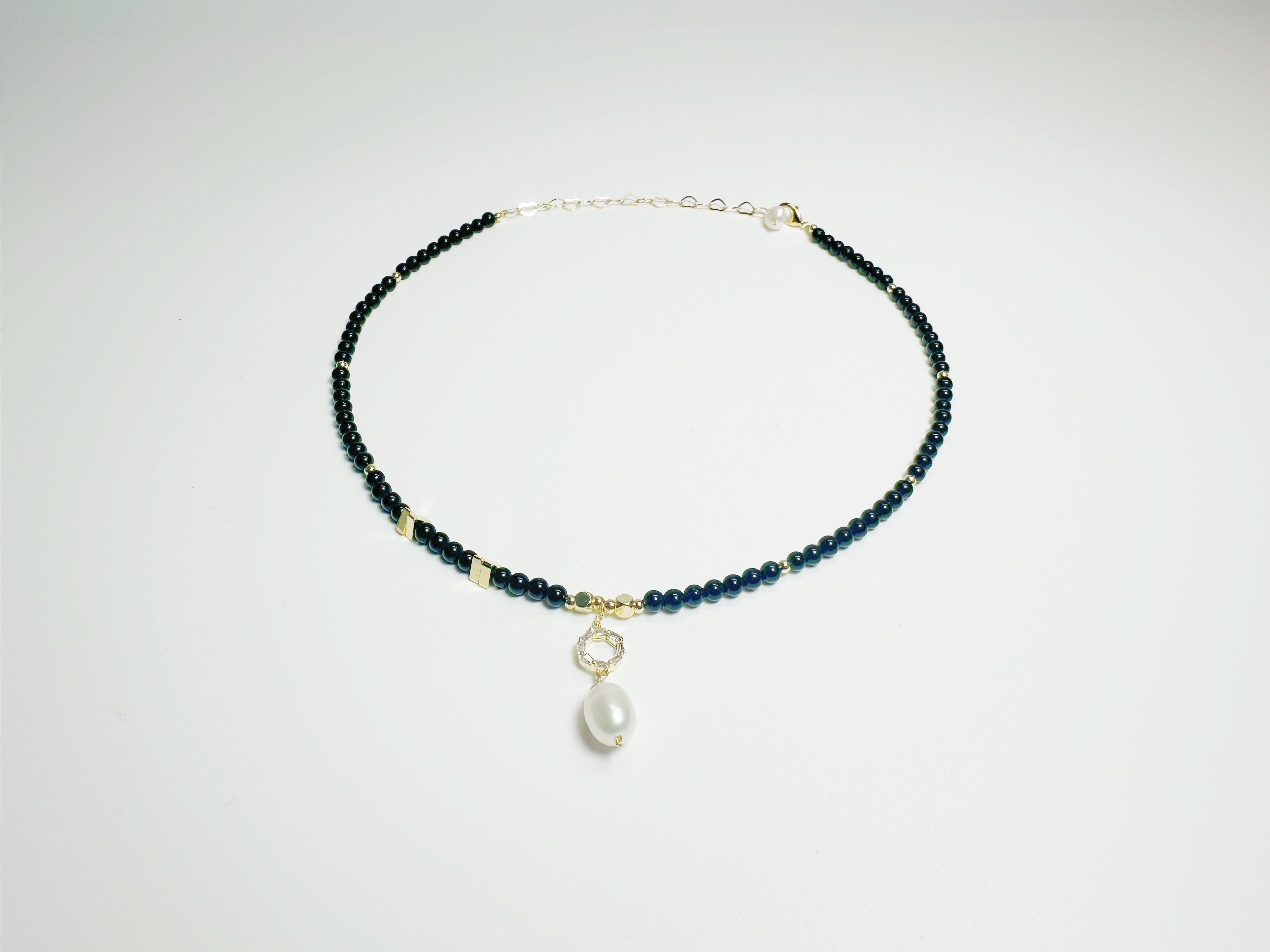 The Jìng(静):  Feng Shui Black Agate & Pearl bracelet for protection + intuition boost. Hand-polished metaphysical talisman with optional Baiyun Temple blessing. Shields against negative energy .