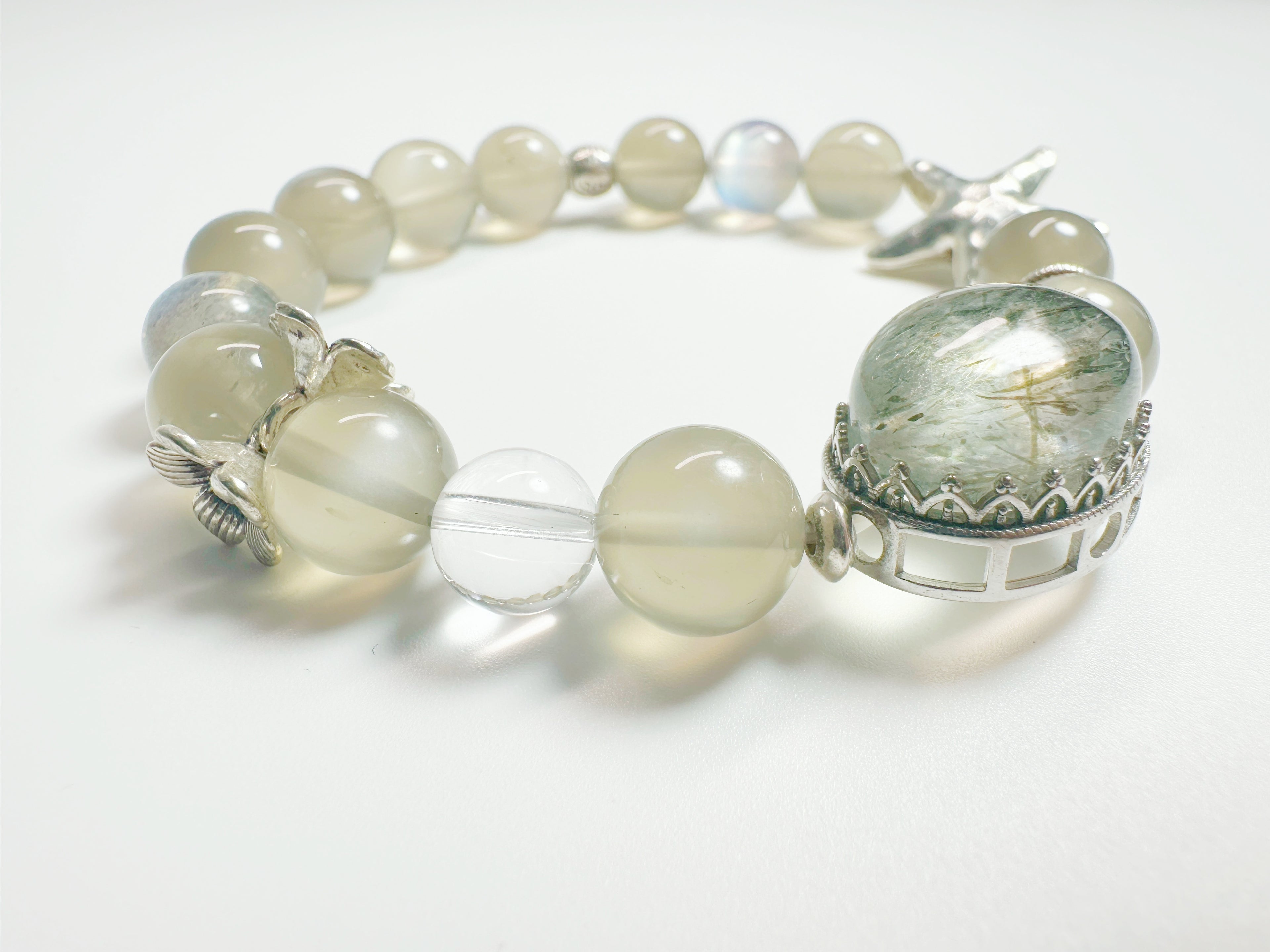 Feng Shui Stone & moonstone garden pendant with tourmaline quartz. Combines silver moonstone clarity + green tourmaline protection. Optional Baiyun Temple blessing for cosmic energy alignment.